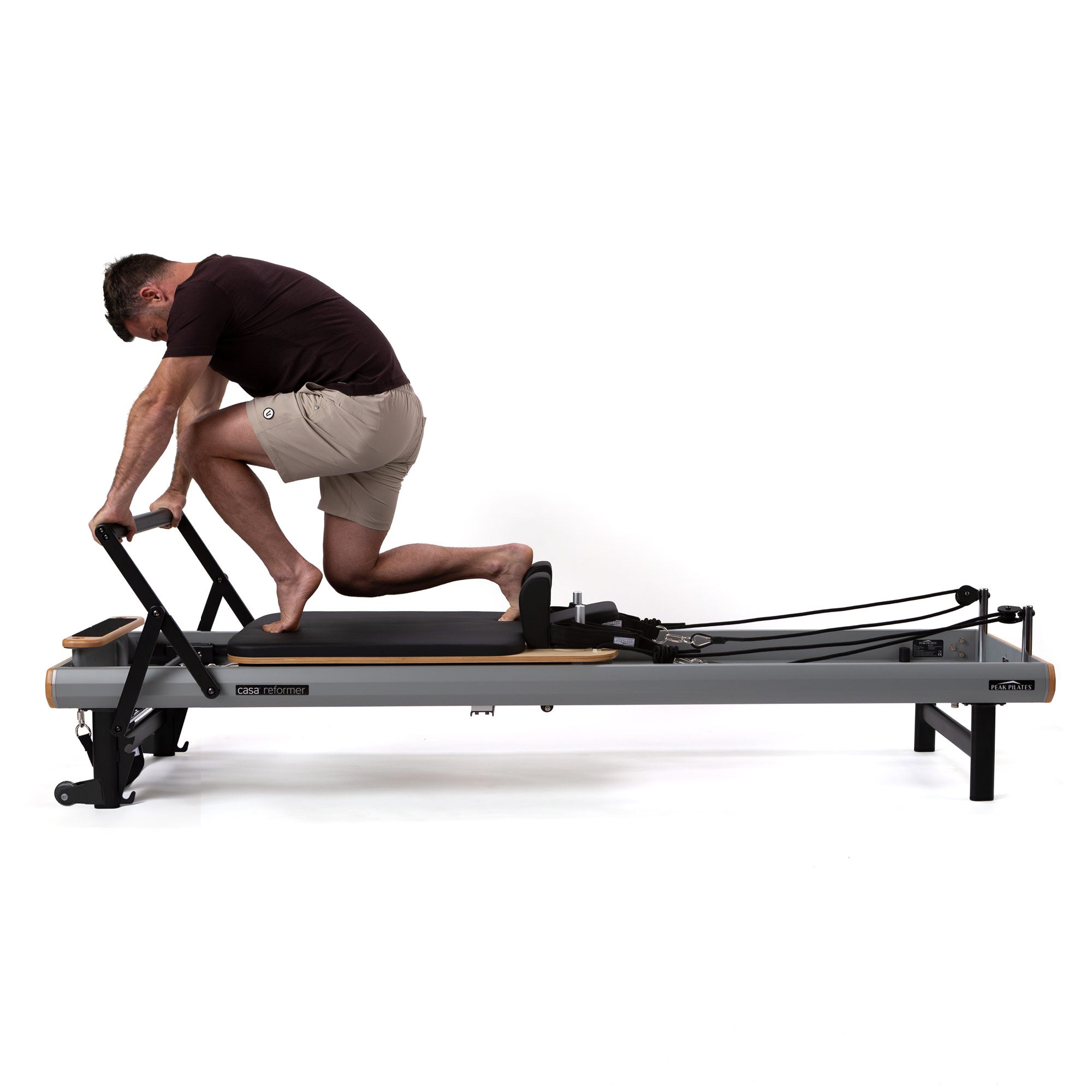 Person using casa reformer by Peak Pilates